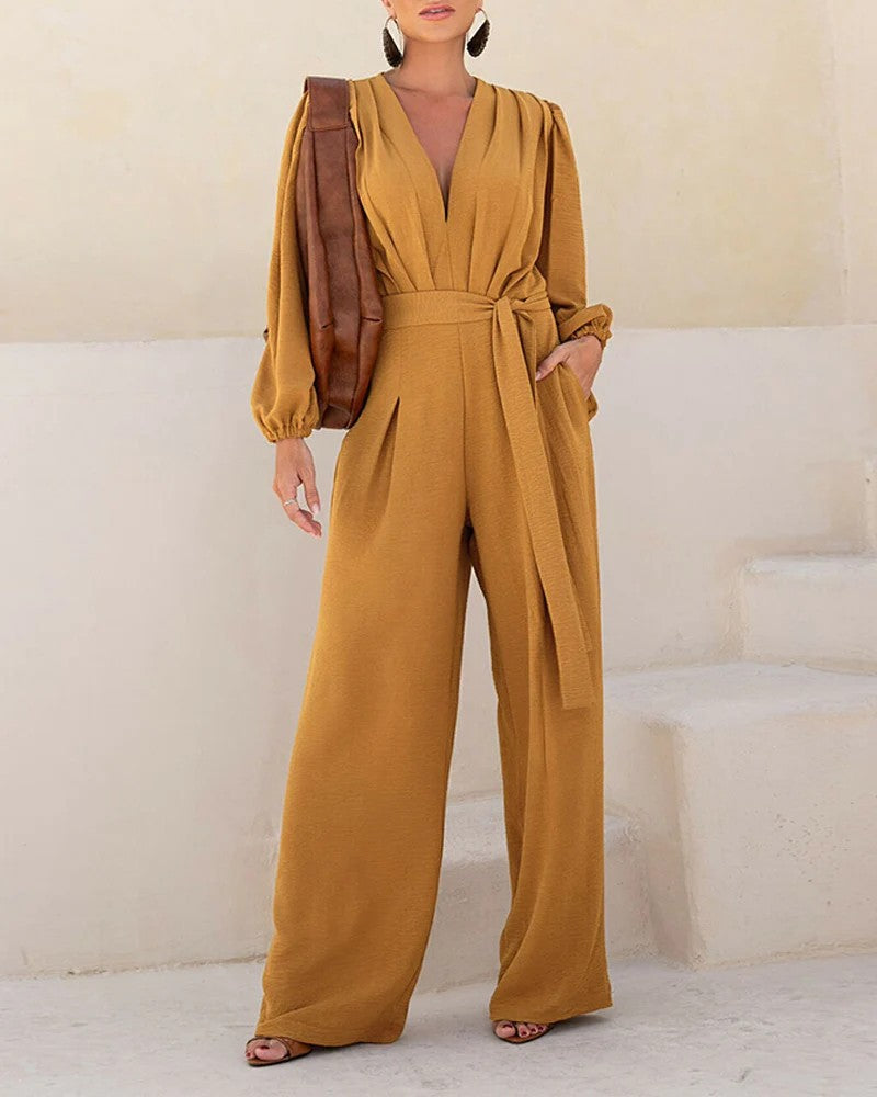 Damen Eleganter Palazzo-Jumpsuit mit tiefem V‑Ausschnitt, Bindegürtel und Ballonärmeln Shop Nory