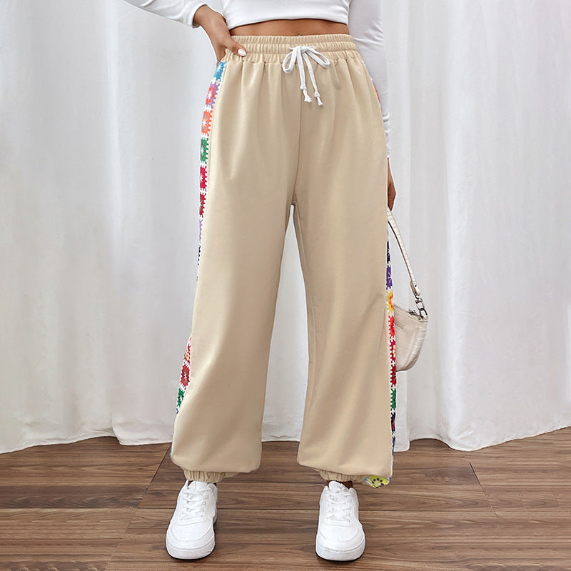 Damen Locker sitzende Jogginghose mit Gummibund, Tunnelzug und bunten Seitenstreifen Shop Nory
