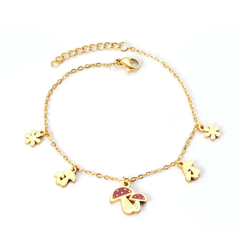 Damen Armband mit verspieltem Hotdog-Anhänger und goldfarbener Kettenstruktur Shop Nory