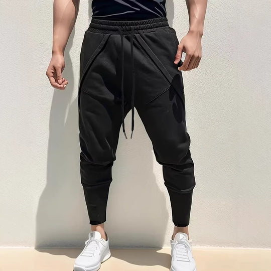 Herren Tapered-Jogginghose mit tiefem Schritt, elastischem Bund & diagonalgesetzten Taschen Shop Nory