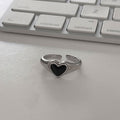 Damenring mit herzförmigem, schwarzem Stein und elegantem Silberdesign Shop Nory