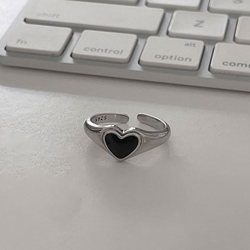Damenring mit herzförmigem, schwarzem Stein und elegantem Silberdesign Shop Nory