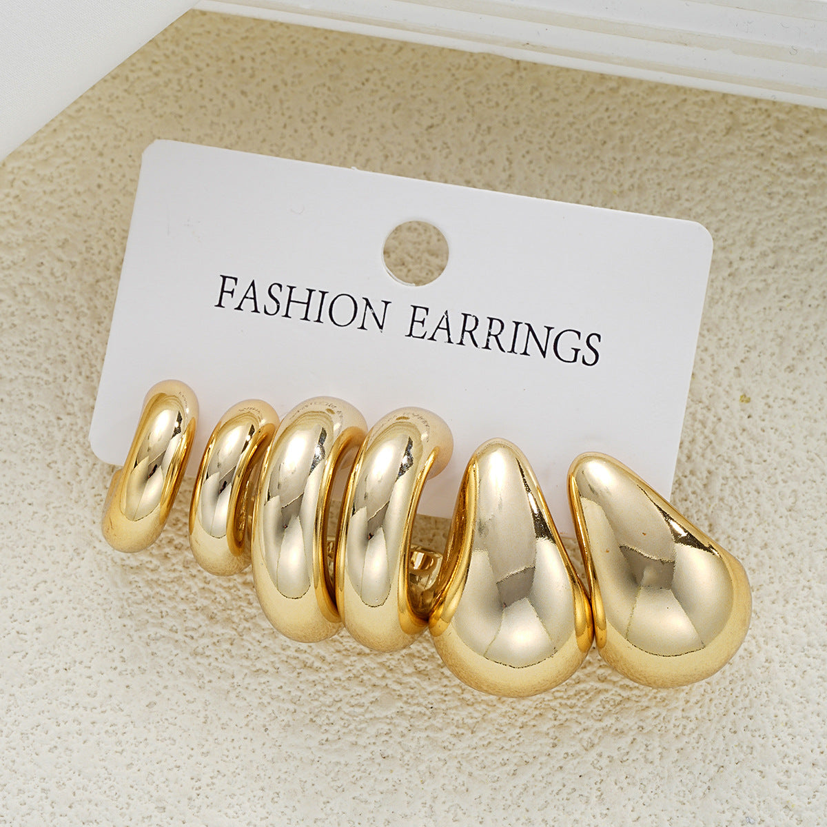 Damen skulptierte Modeschmuck-Ohrringe Shop Nory