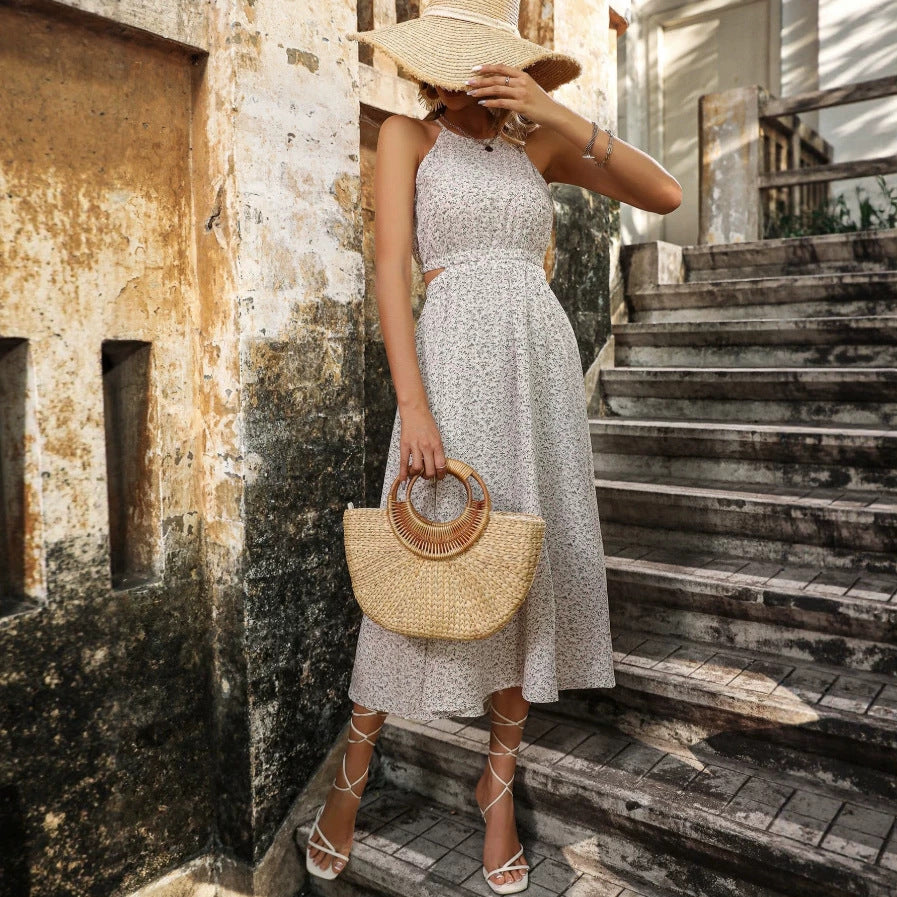 Damen Maxikleid mit floralem Design und schwingendem Saum