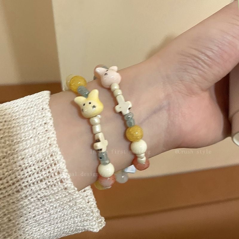 Damen handgemachtes Armband mit einzigartigen Tieranhängern Shop Nory