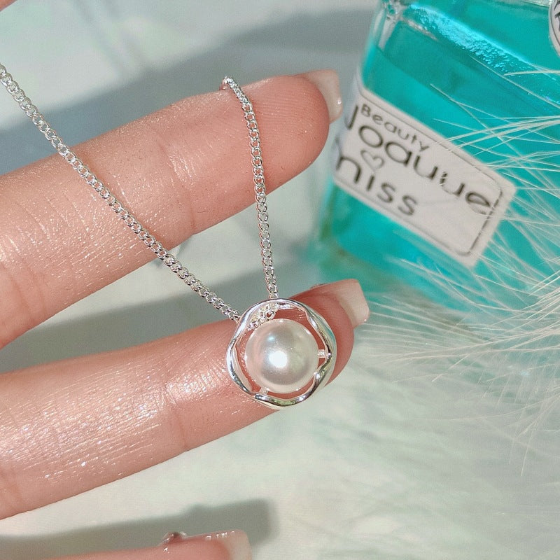 Damen Halskette mit stilvollem Perlenanhänger und feinem Drahtdesign Shop Nory