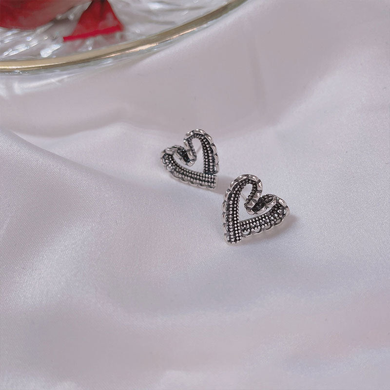 Damen Ohrringe mit filigranem Herzdesign Shop Nory