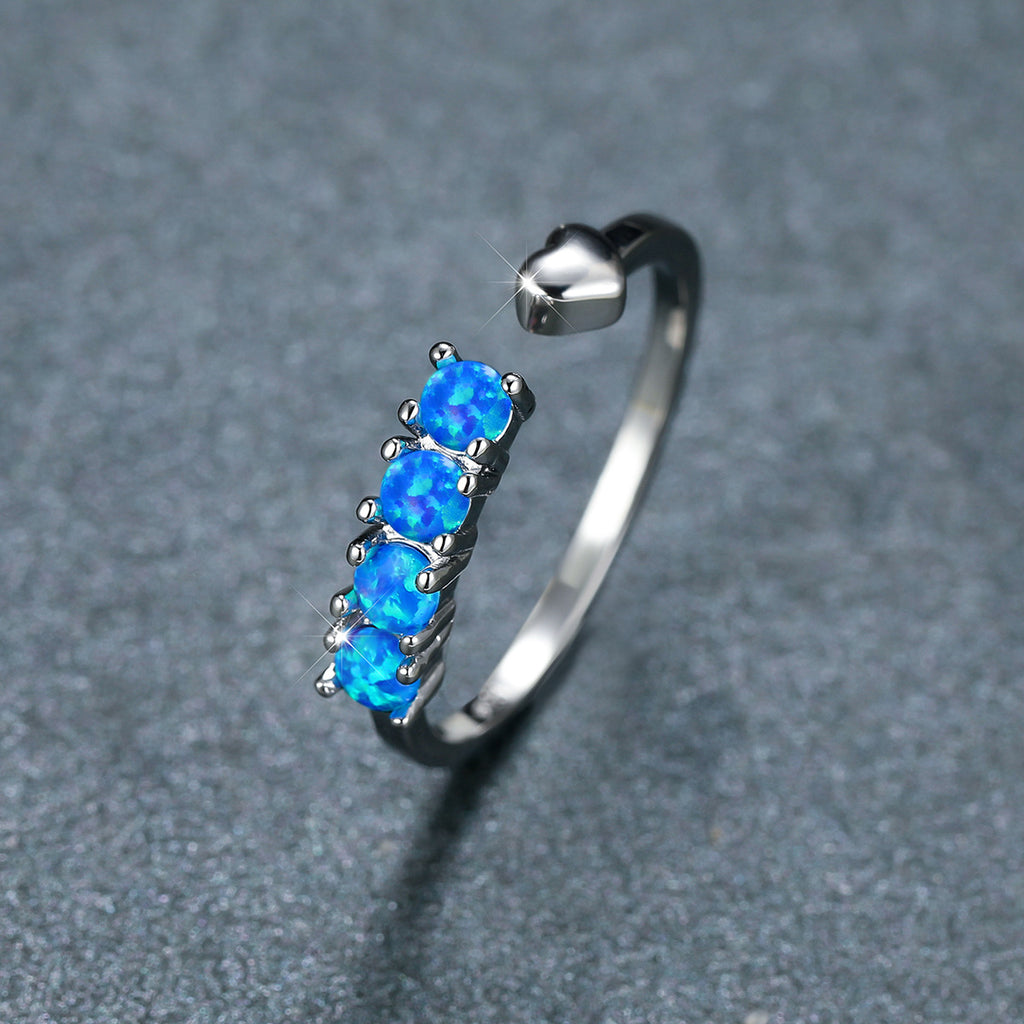 Damen Ring mit leuchtenden Opalsteinen Shop Nory