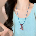 Damen Kette mit verspieltem Brillenanhänger Shop Nory