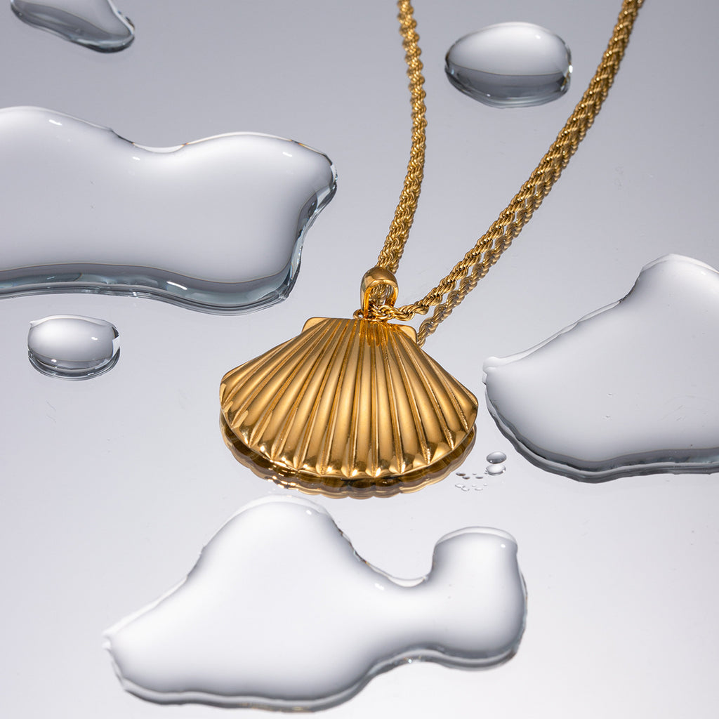 Damen Halskette mit maritimem Muschel-Anhänger und elegantem Kordeldesign Shop Nory