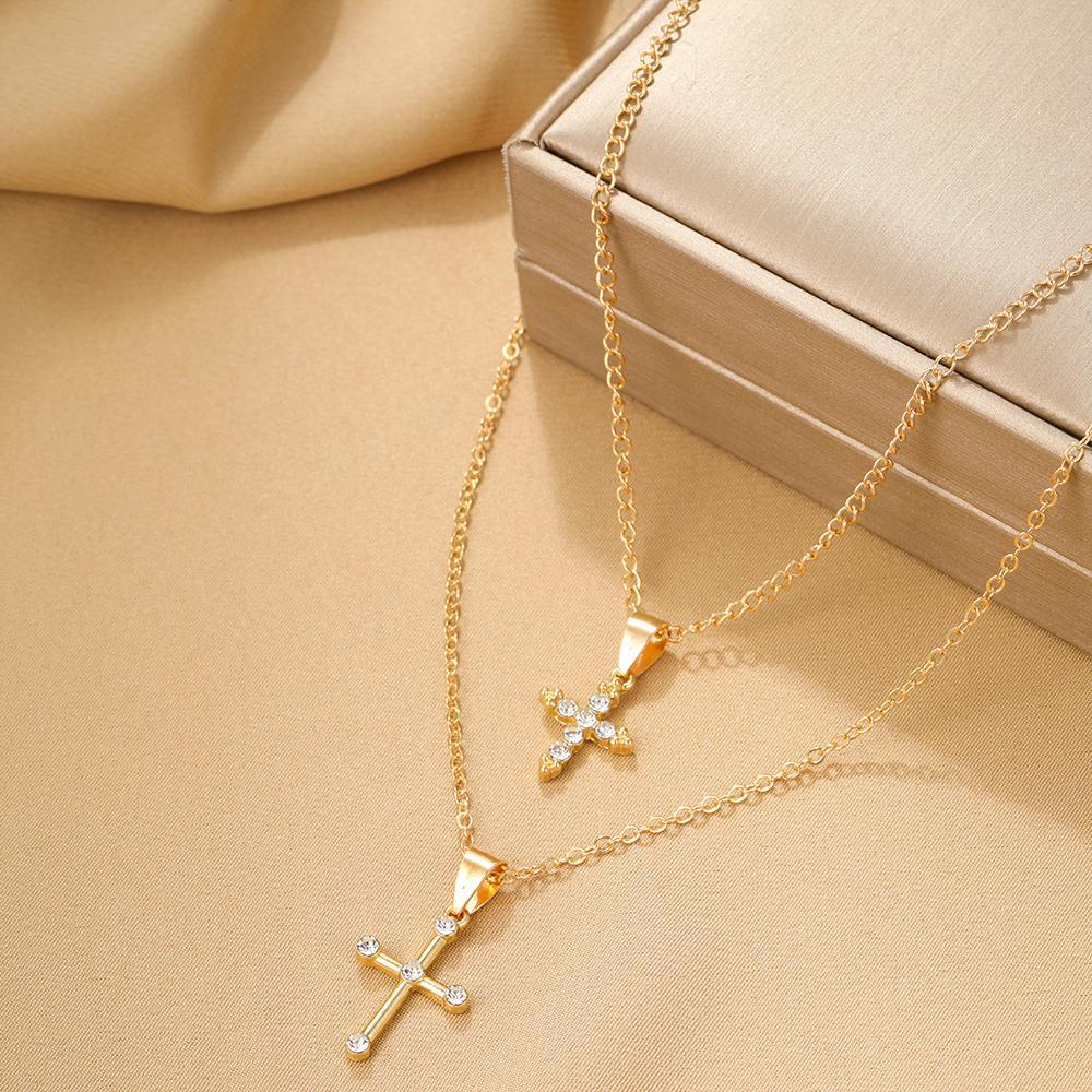 Damen Halskette mit Kreuzanhängern und funkelnden Zirkonia Shop Nory