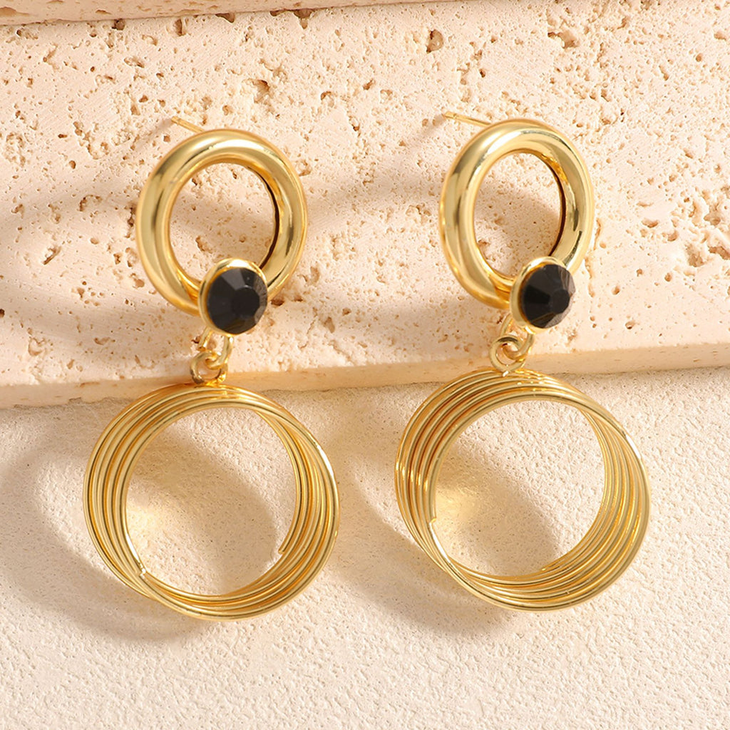 Damen Ohrringe mit elegantem spiralförmigem Design Shop Nory