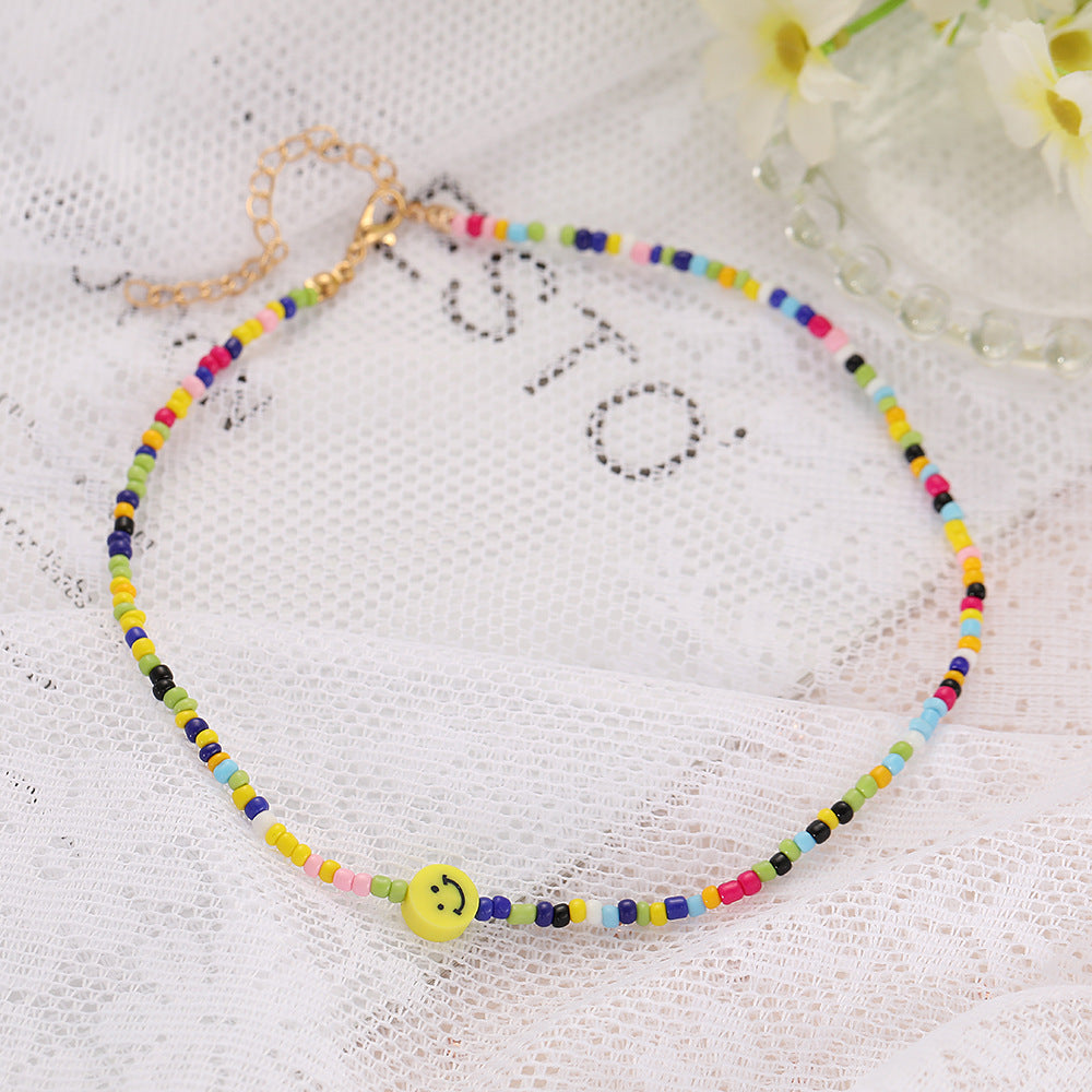 Damen bunte Perlenhalskette mit Smiley-Anhänger Shop Nory