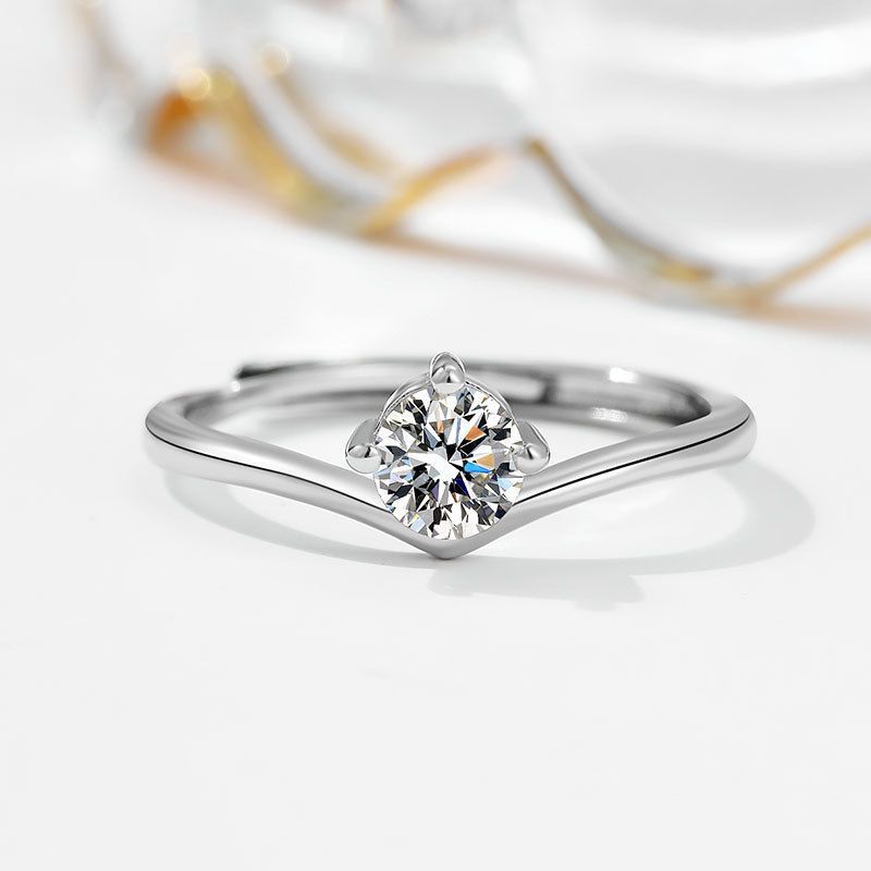 Damen eleganter Ring mit funkelndem Solitär und verspieltem Zirkonia-Besatz Shop Nory
