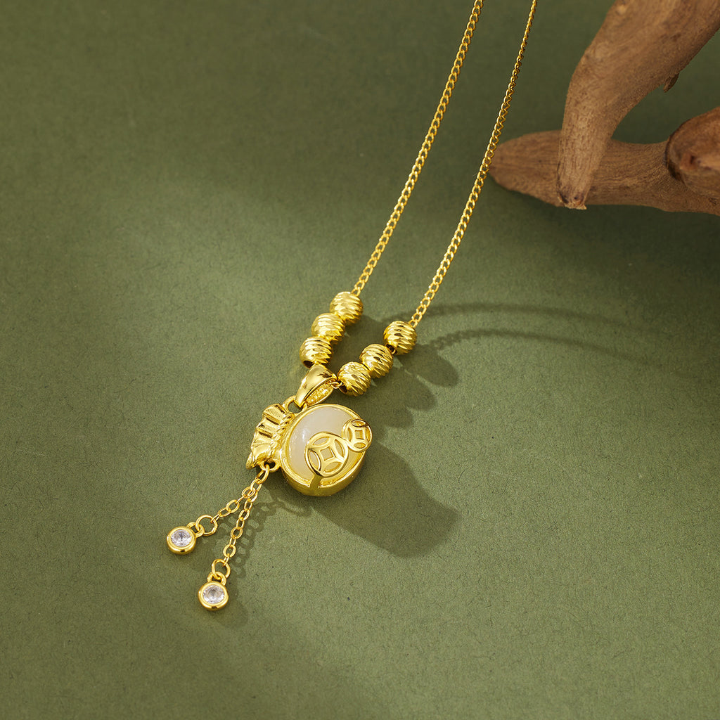 Damen Halskette mit kunstvollem Anhänger aus hochwertigem goldfarbenen Metall und Zirkonia-Details Shop Nory