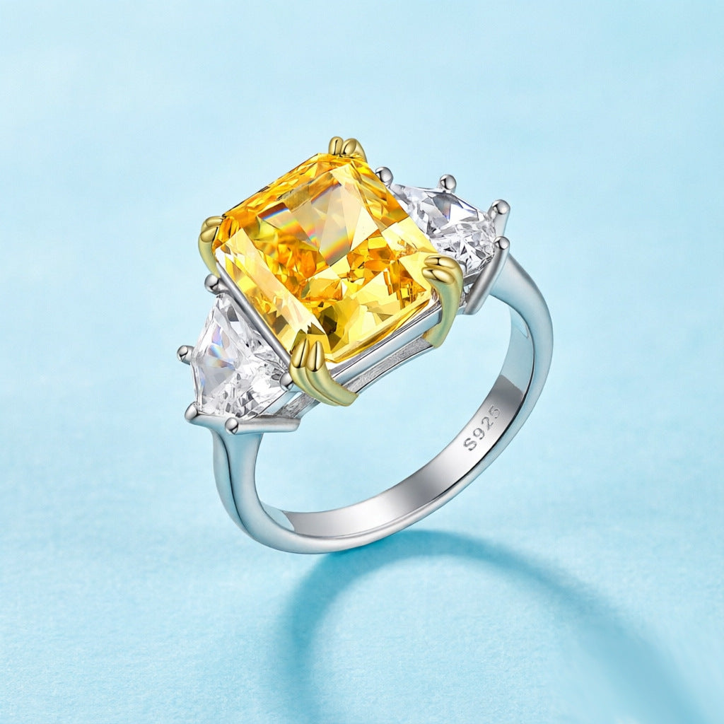 Damenring mit extravagantem, rechteckigem Hauptstein und funkelnden Zirkonia-Shop Nory