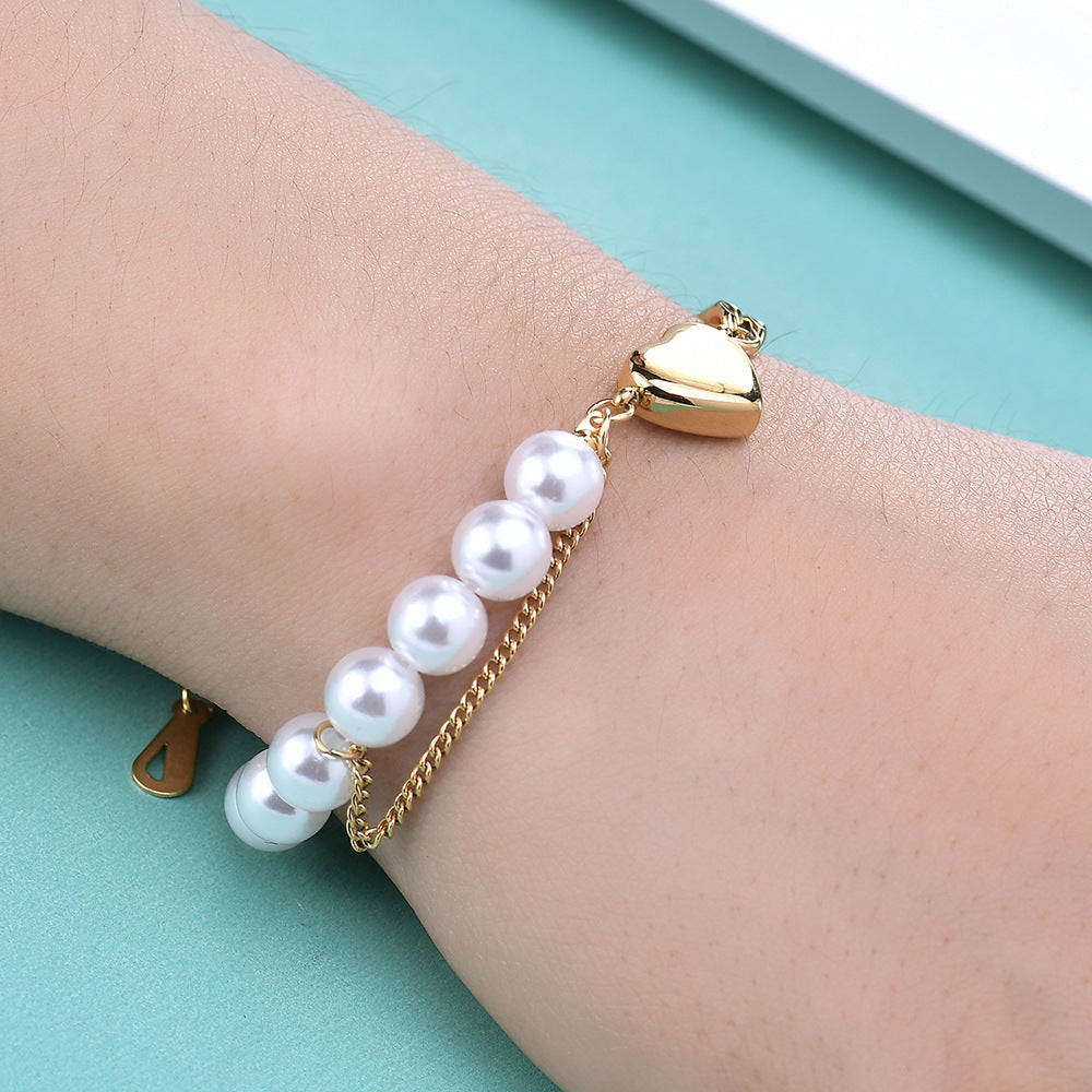 Damen Armband mit perlenbesetztem Herzen Shop Nory