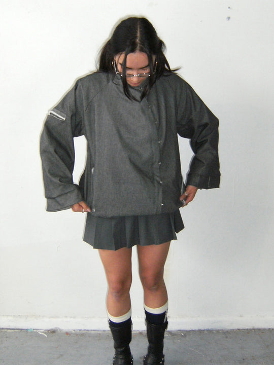 Damen Oversize-Boxy-Jacke mit asymmetrischem Druckknopfverschluss und Ärmeltasche Shop Nory