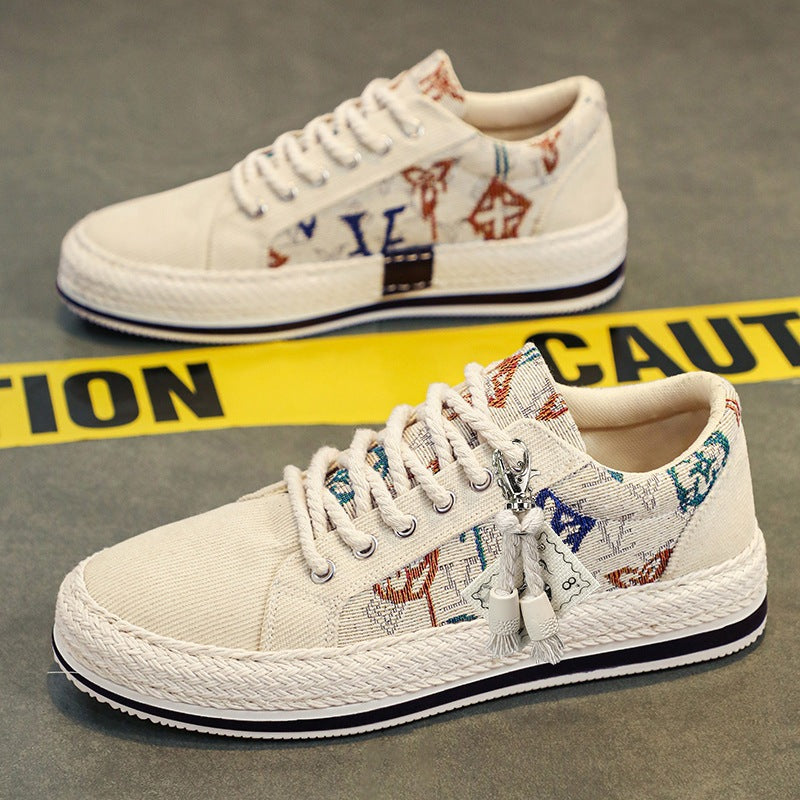 Damen bestickte Canvas‑Sneaker mit Quastenanhänger und geflochtener Plateausohle Shop Nory