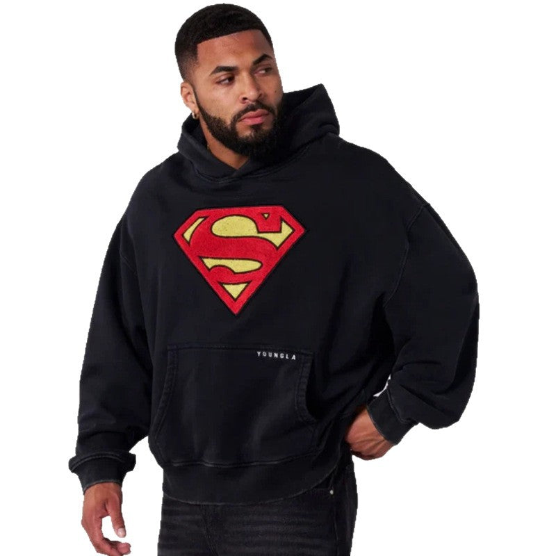 Herren nan weit geschnittener Kapuzenpullover mit markantem Comic‑S‑Logo Kängurutasche und gewaschener Look