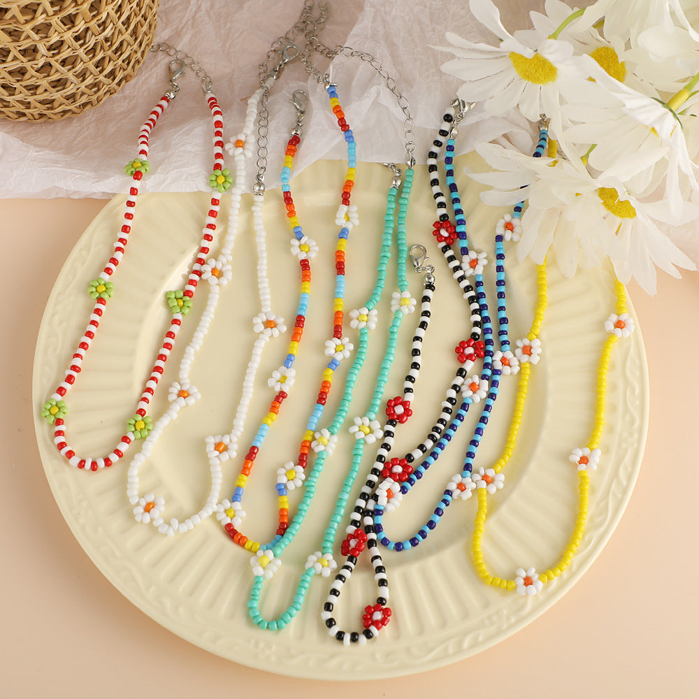 Damen feine Halskette mit goldfarbenen Akzenten und eleganten Glasperlen Shop Nory