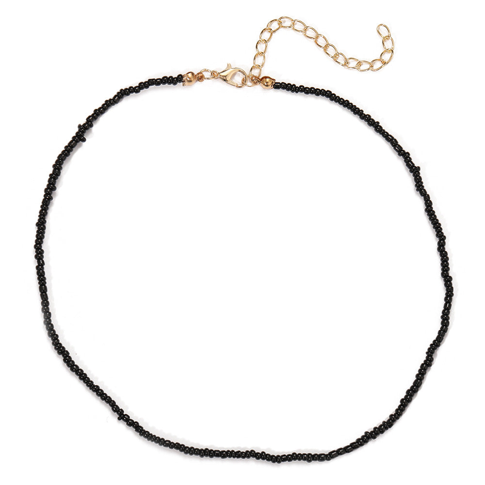 Damen feine Halskette mit goldfarbenen Akzenten und eleganten Glasperlen Shop Nory