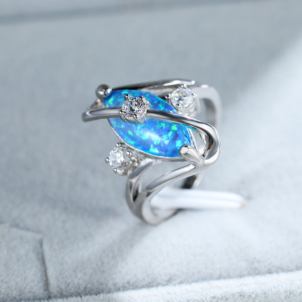 Damen Ring mit funkelndem Opal und eleganten Zirkonia-Details Shop Nory