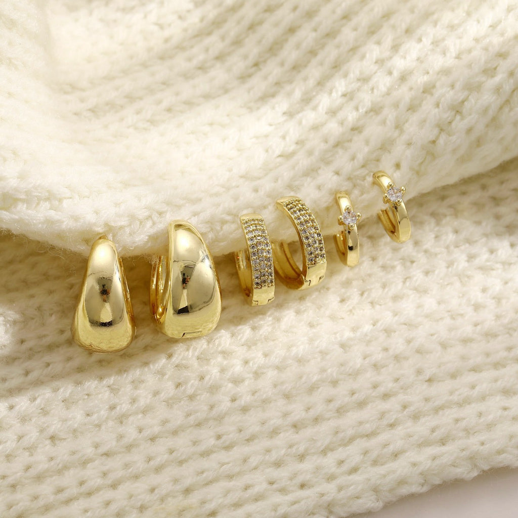 Damen Ohrringe Set mit funkelnden Zirkonia und geschwungenem Design Shop Nory