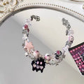 Damen Armband mit bunten Kristallen und verspieltem Charme Shop Nory