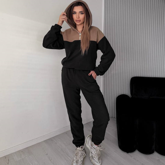 Damen Zweiteiliges Farbblock-Loungewear-Set mit halbem Reißverschluss und schmaler Jogginghose Shop Nory