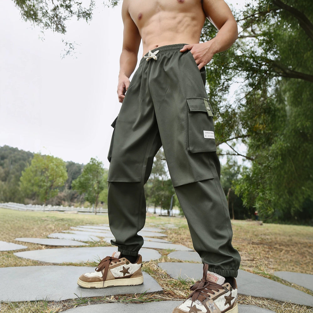 Herren Multifunktionale Cargo-Joggerhose mit elastischem Tunnelzugbund, verschließbaren Beintaschen und verstärkten Knieeinsätzen Shop Nory