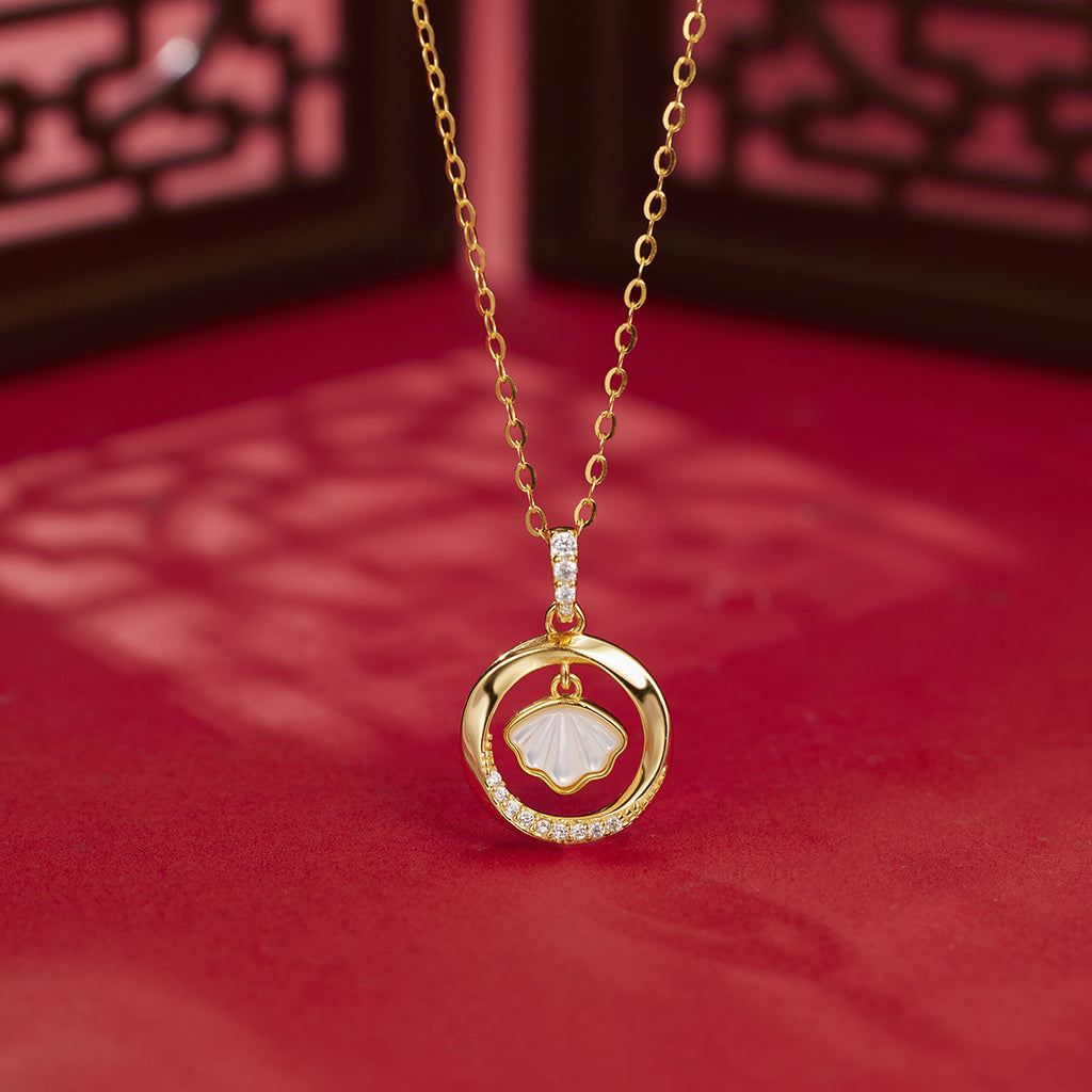 Damen elegante Halskette mit muschelförmigem Anhänger und funkelnden Zirkonia Shop Nory