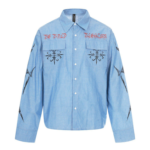 Unisex Oversize-Hemdjacke mit aufgesetzten Brusttaschen und dekorativen Printdetails Shop Nory