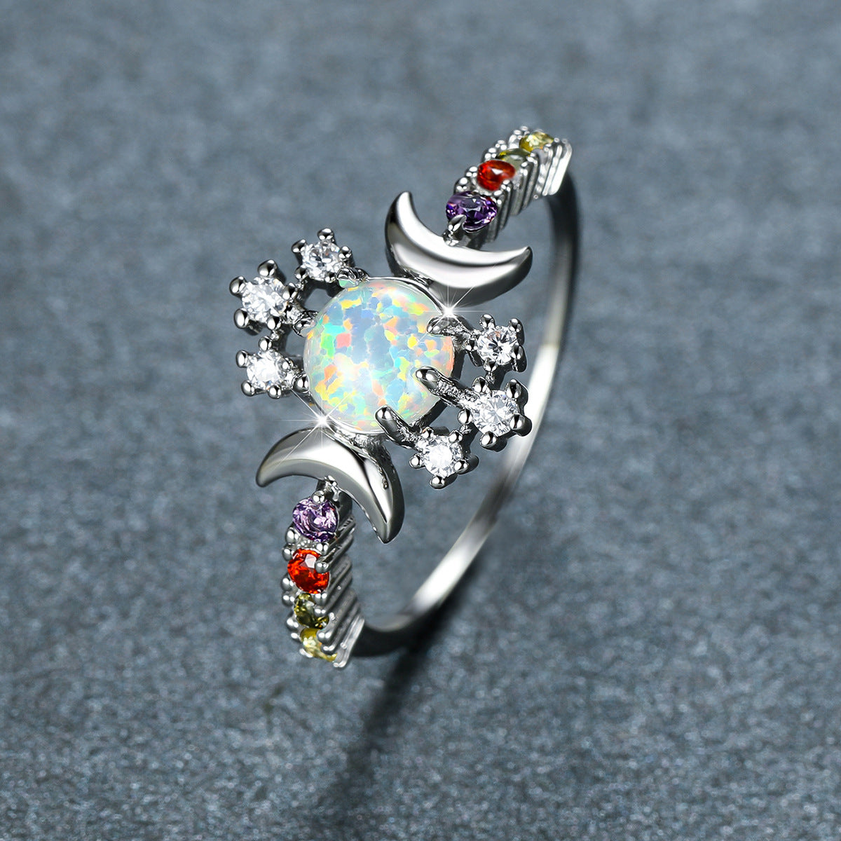 Damen Ring mit schimmerndem Opalsteinglanz und funkelnden Zirkonia-Elementen Shop Nory