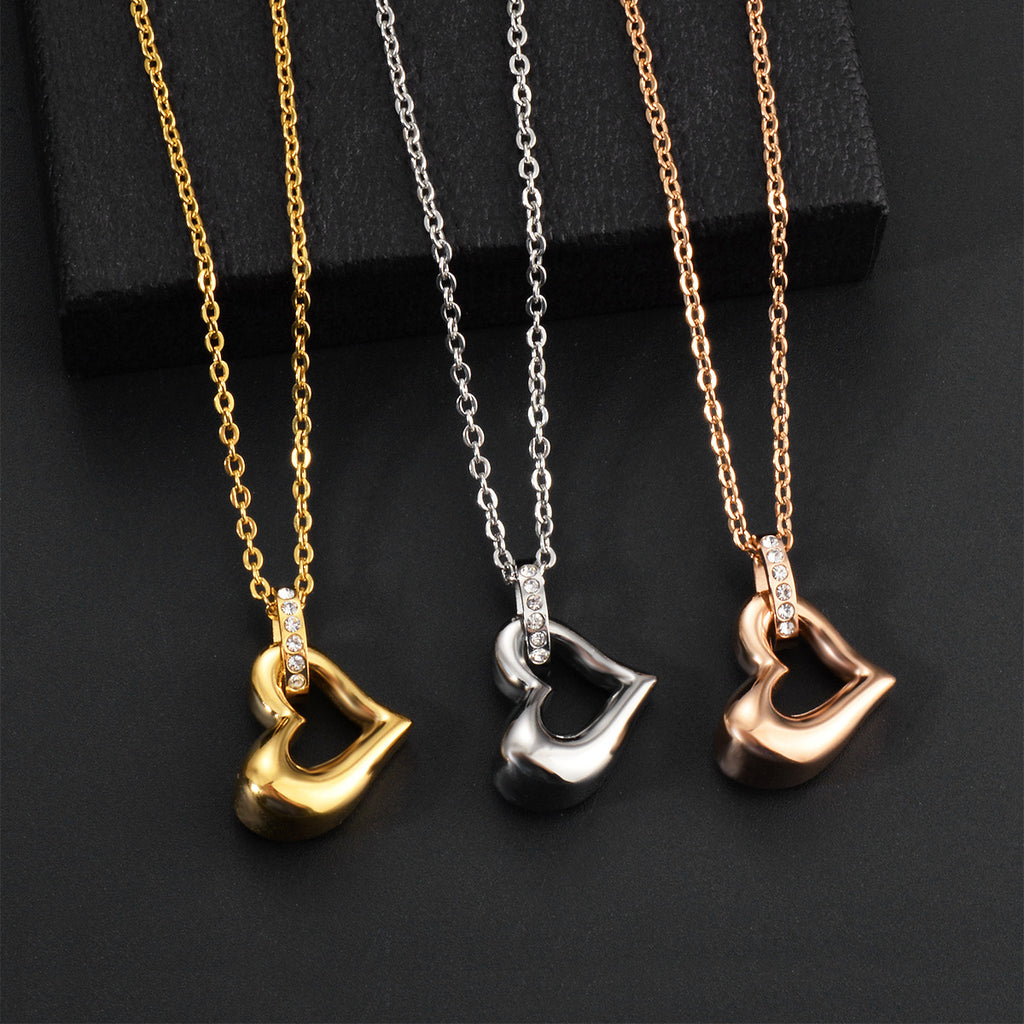 Damen Anhänger mit Herzmotiv und funkelnden Zirkonia Shop Nory
