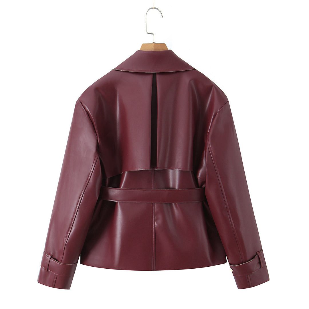 Damen Taillierte kurze Trenchjacke mit Bindegürtel und Cape-Detail aus veganer Lederoptik Shop Nory