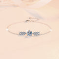 Damenarmband mit funkelndem Zirkonia und elegantem Blattdesign Shop Nory