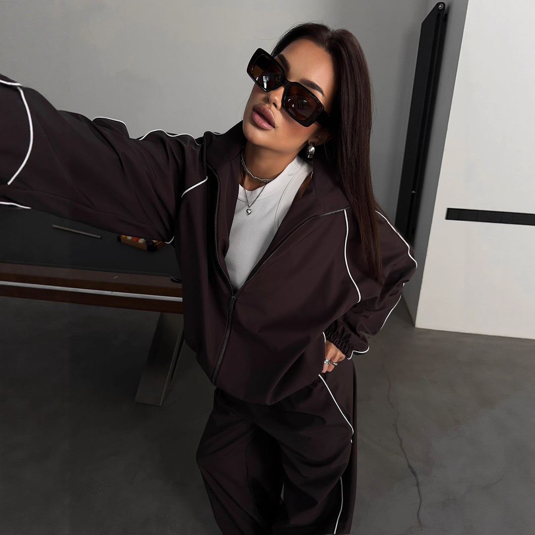 Damen sportives zweiteiliges Trainingsset mit Bomberjacke und weitem Jogginghose aus technischem Funktionsmaterial Shop Nory