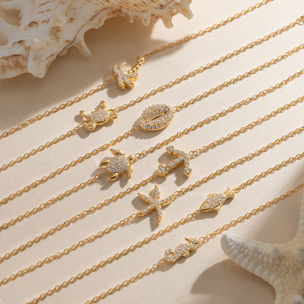 Damen Armreif mit muschelförmigem Design aus hypoallergenem Edelstahl Shop Nory