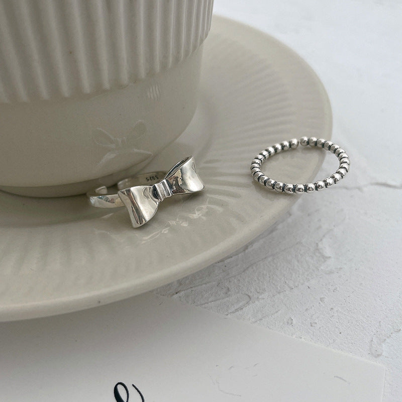 Damenring mit modernem, kugelförmigem Design Shop Nory