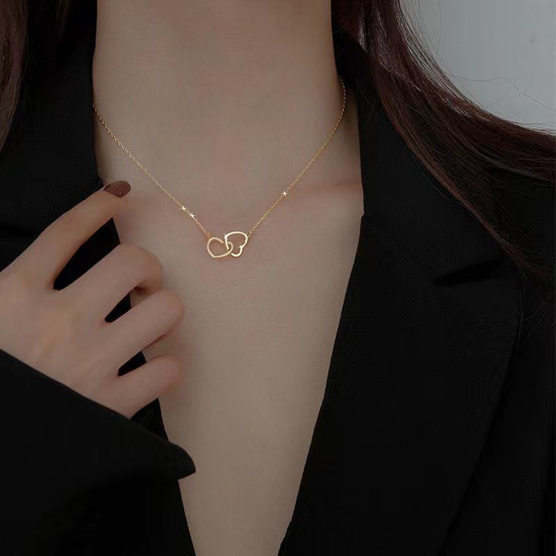 Damen Halskette mit doppeltem Herzanhänger und filigraner Silberkette Shop Nory