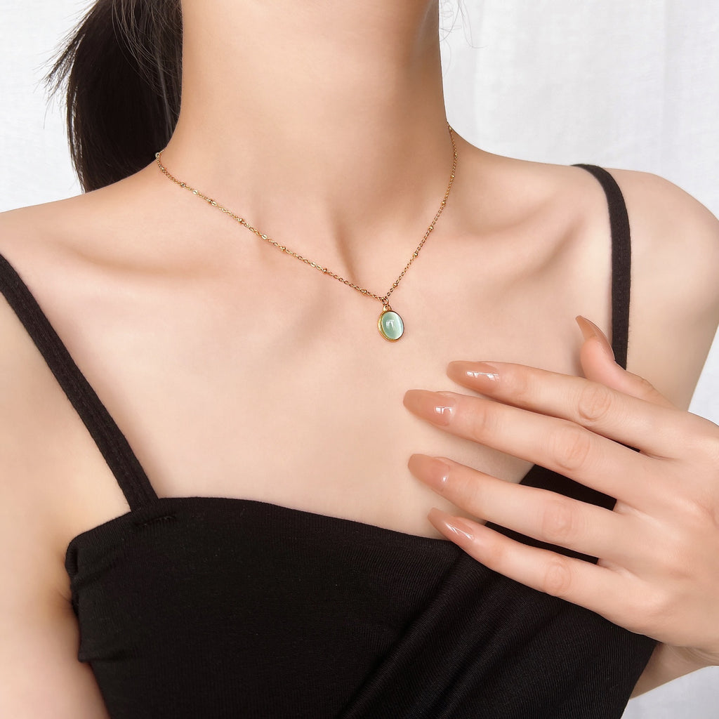 Damen elegante Halskette mit ovalem Anhänger und goldener Kette Shop Nory