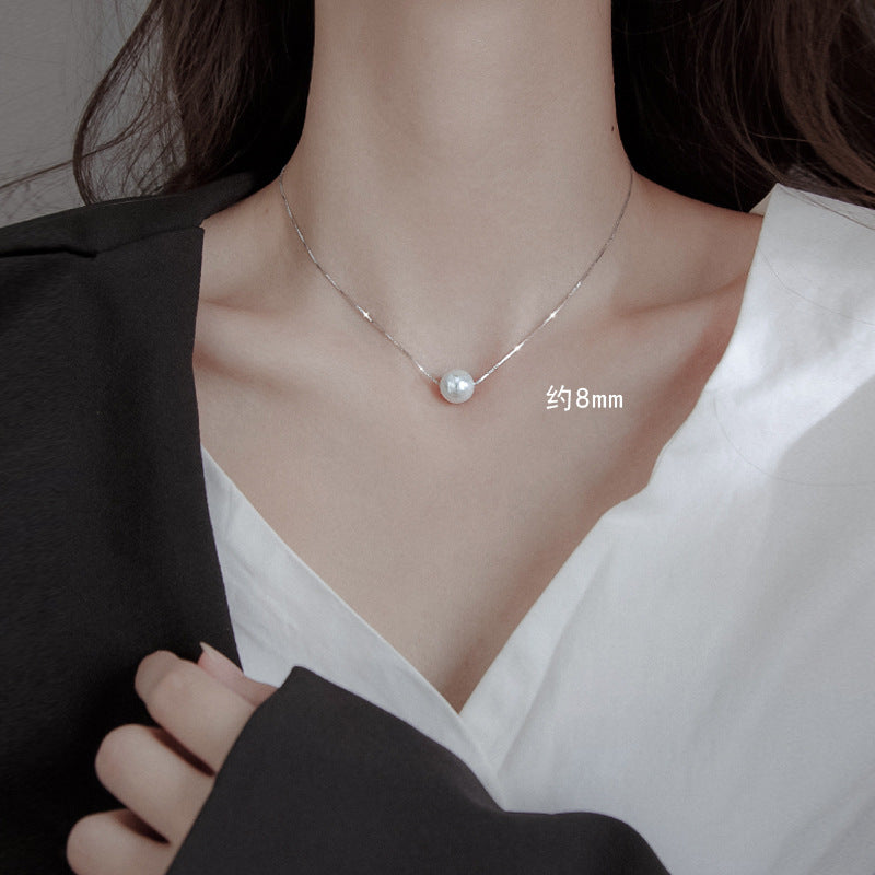 Damen Halskette mit luxuriösem Perlenanhänger und feiner Kettenstruktur Shop Nory