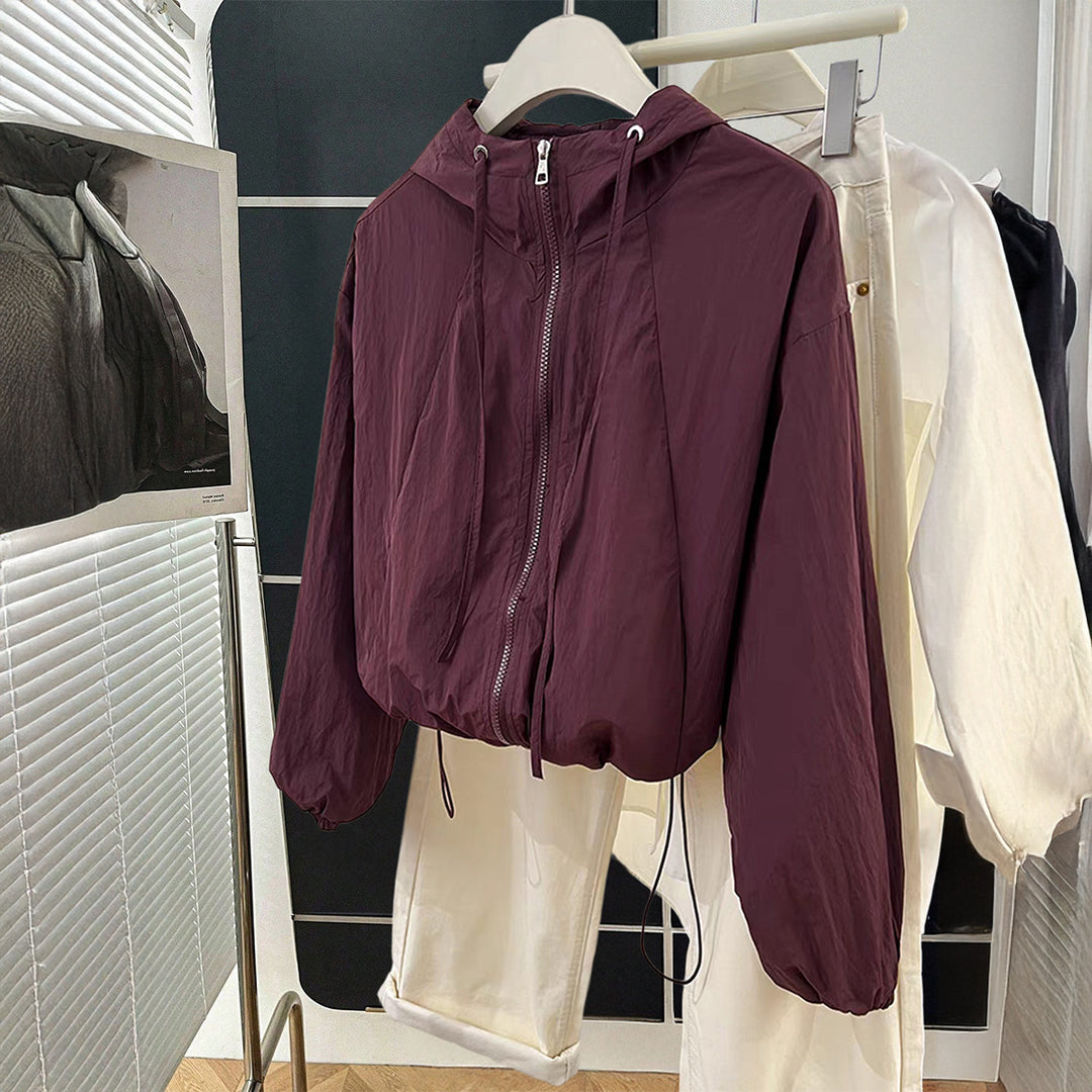 Damen nan leichtgewichtige Kapuzen-Übergangsjacke mit Tunnelzugbündchen und Ballonärmeln Shop Nory