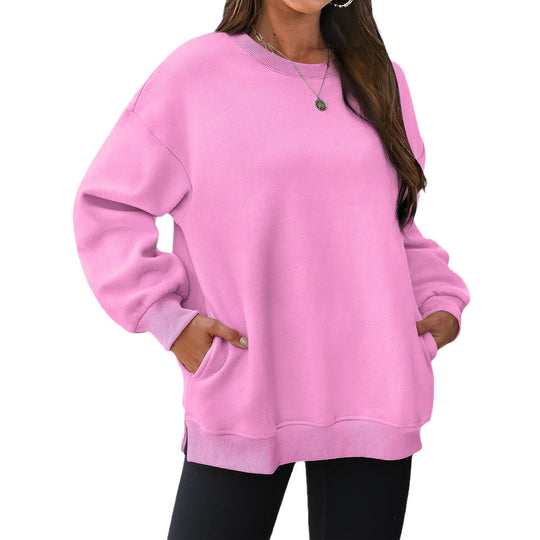 Damen nan verlängertes Oversize Rundhalspullover mit seitlichen Eingrifftaschen, Rippbündchen und überschnittener Schulter Shop Nory