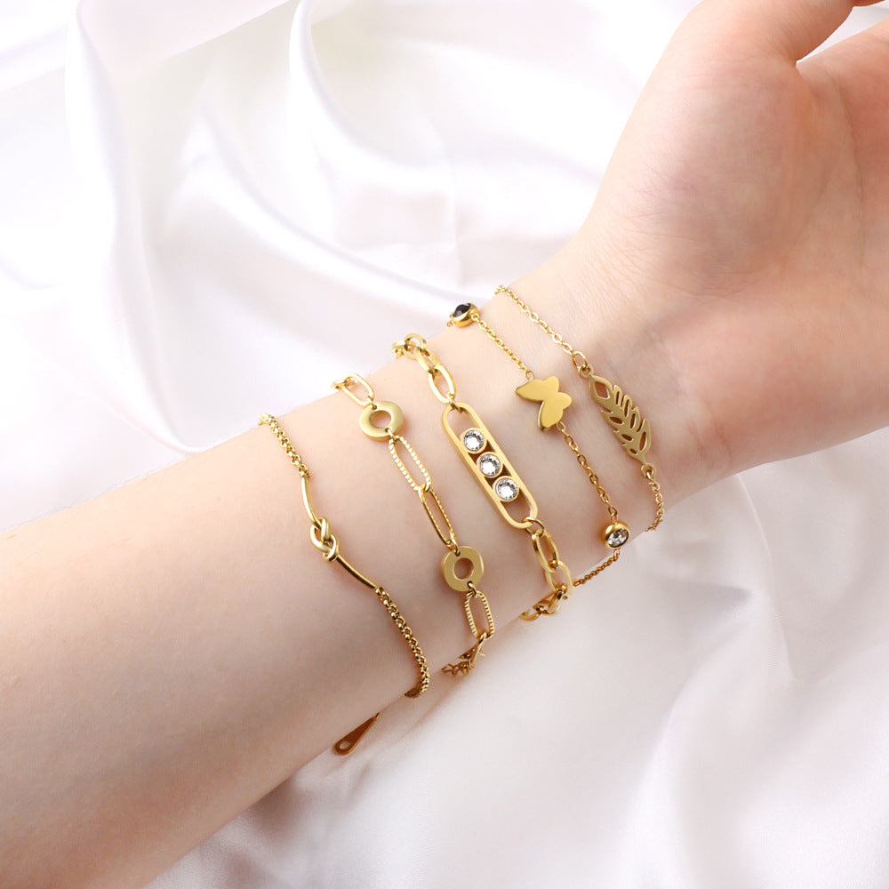 Damen edles Armband mit filigranen Schmetterlingsanhängern und Kristallakzenten Shop Nory