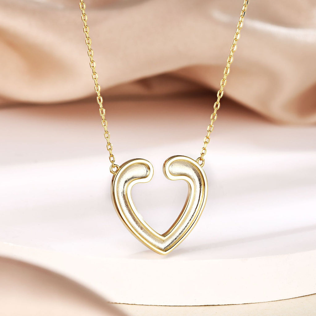 Damen Halskette mit herzförmigem Anhänger und funkelndem Zirkonia-Besatz Shop Nory
