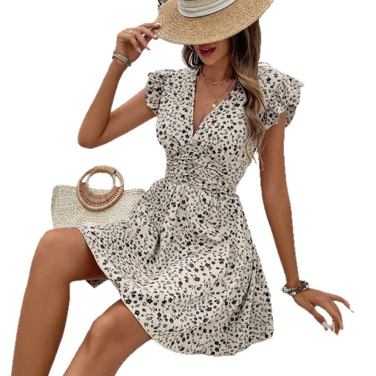 Damen Minikleid mit floralem V-Ausschnitt und Rüschendetails Shopnory