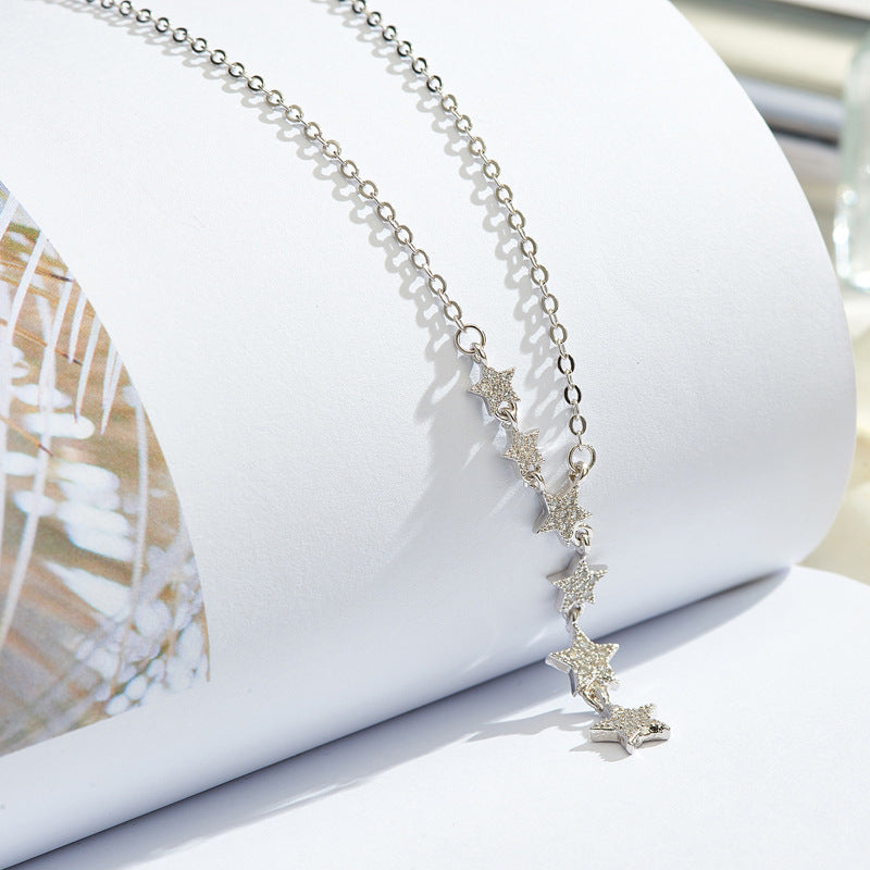 Damen Halskette mit funkelnden Sternen und elegantem Anhänger Shop Nory