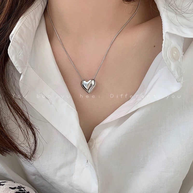 Damen Halskette mit herzförmigem Anhänger aus hochwertigem Edelstahl Shop Nory